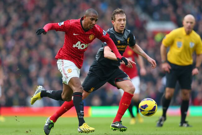 Hi-res-159404385-ashley-young-of-manchester-united-competes-with-lucas_crop_north