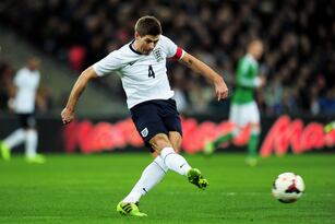 Hi-res-450616257-steven-gerrard-of-england-takes-a-shot-on-goal-during_crop_north