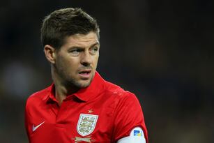 Hi-res-180241978-steven-gerrard-of-england-looks-on-during-the-fifa-2014_crop_north