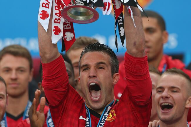 Hi-res-168611909-robin-van-persie-of-manchester-united-lifts-the-premier_crop_north