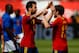 Jun 8, 2013; Miami Gardens, FL, USA; Spain midfielder Juan Mata (13) celebrates a goal with teammate midfielder Cesc Fabregas (left) against Haiti during the first half of a friendly at Sun Life Stadium. Mandatory Credit: Robert Mayer-USA TODAY Sports