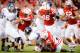 LINCOLN, NE - NOVEMBER 2: Defensive tackle Vincent Valentine #98 of the Nebraska Cornhuskers, defensive end Randy Gregory #44 of the Nebraska Cornhuskers, defensive tackle Aaron Curry #96 of the Nebraska Cornhuskers, and cornerback Ciante Evans #17 of the Nebraska Cornhuskers bring down quarterback Kain Colter #2 of the Northwestern Wildcats during their game at Memorial Stadium on November 2, 2013 in Lincoln, Nebraska. (Photo by Eric Francis/Getty Images)