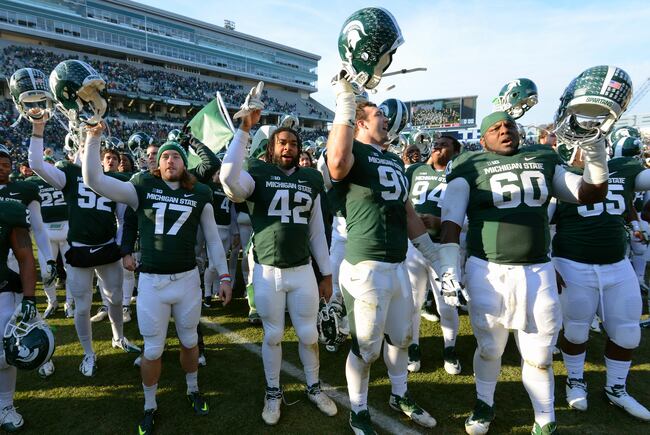 Hi-res-452643559-michigan-state-spartans-players-celebrate-the-victory_crop_north