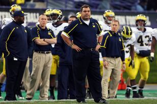 Hi-res-450091639-head-coach-brady-hoke-of-the-michigan-wolverines-reacts_crop_north
