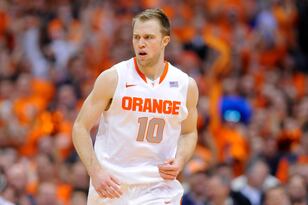 Hi-res-453365185-trevor-cooney-of-the-syracuse-orange-reacts-after-a_crop_north