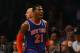 NEW YORK, NY - DECEMBER 05: Iman Shumpert #21 of the New York Knicks celebrates scoring against the Brooklyn Nets during their game at the Barclays Center on December 5, 2013 in the Brooklyn borough of New York City. NOTE TO USER: User expressly acknowledges and agrees that, by downloading and or using this photograph, User is consenting to the terms and conditions of the Getty Images License Agreement. (Photo by Al Bello/Getty Images)