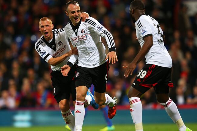 Hi-res-185494015-dimitar-berbatov-of-fulham-celebrates-with-teammates_crop_north