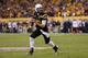 TEMPE, AZ - NOVEMBER 30: Quarterback Taylor Kelly #10 of the Arizona State Sun Devils drops back to pass during the college football game against the Arizona Wiildcats at Sun Devil Stadium on November 30, 2013 in Tempe, Arizona. The Sun Devils defeated the Wildcats 58-21. (Photo by Christian Petersen/Getty Images)