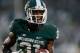EAST LANSING, MI - NOVEMBER 02: Darqueze Dennard #31 of the Michigan State Spartans celebrates his fourth-quarter interception against the Michigan Wolverines at Spartan Stadium on November 2, 2013 in East Lansing, Michigan. Michigan State won the game 29-6. (Photo by Gregory Shamus/Getty Images)