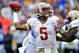 Nov 30, 2013; Gainesville, FL, USA; Florida State Seminoles quarterback Jameis Winston (5) throws a pass against the Florida Gators at Ben Hill Griffin Stadium. Florida State won 37-7. Mandatory Credit: Steve Mitchell-USA TODAY Sports