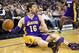 Dec 6, 2013; Sacramento, CA, USA; Los Angeles Lakers center Pau Gasol (16) looks to pass the ball from the floor against the Sacramento Kings during the second quarter at Sleep Train Arena. Mandatory Credit: Kelley L Cox-USA TODAY Sports