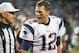 Nov 18, 2013; Charlotte, NC, USA; New England Patriots quarterback Tom Brady (12) argues with a referee while walking off the field at Bank of America Stadium. The Panthers defeated the Patriots 24-20. Mandatory Credit: Jeremy Brevard-USA TODAY Sports