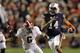 Nov 30, 2013; Auburn, AL, USA; Auburn Tigers quarterback Nick Marshall (14) runs against Alabama Crimson Tide defensive back Ha Ha Clinton-Dix (6) during the fourth quarter at Jordan Hare Stadium. Mandatory Credit: John Reed-USA TODAY Sports