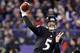 Nov 28, 2013; Baltimore, MD, USA; Baltimore Ravens quarterback Joe Flacco (5) throws a pass against the Pittsburgh Steelers during a NFL football game on Thanksgiving at M&T Bank Stadium. Mandatory Credit: Mitch Stringer-USA TODAY Sports
