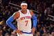 NEW YORK, NY - NOVEMBER 5: Carmelo Anthony #7 of the New York Knicks looks on against the Charlotte Bobcats during the game on November 5, 2013 at Madison Square Garden in New York City, New York. NOTE TO USER: User expressly acknowledges and agrees that, by downloading and or using this photograph, User is consenting to the terms and conditions of the Getty Images License Agreement. Mandatory Copyright Notice: Copyright 2013 NBAE (Photo by Jesse D. Garrabrant/NBAE via Getty Images)