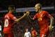 LIVERPOOL, ENGLAND - DECEMBER 07: Martin Skrtel of Liverpool celebrates the second goal with Coutinho during the Barclays Premier League match between Liverpool and West Ham United at Anfield on December 7, 2013 in Liverpool, England. (Photo by Clive Brunskill/Getty Images)