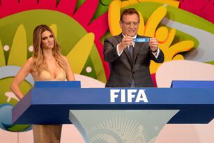 Hi-res-453991567-secretary-general-jerome-valcke-holds-up-the-name-of_crop_north