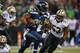 SEATTLE, WA - DECEMBER 02: Running back Marshawn Lynch #24 of the Seattle Seahawks rushes against the New Orleans Saints at CenturyLink Field on December 2, 2013 in Seattle, Washington. (Photo by Otto Greule Jr/Getty Images)