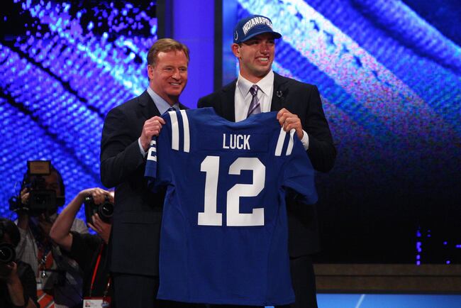 Hi-res-143449690-andrew-luck-from-stanford-holds-up-a-jersey-as-he_crop_north
