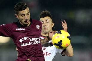 Hi-res-454159143-federico-ceccherini-of-as-livorno-calcio-fights-for-the_crop_north