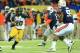 Dec 7, 2013; Atlanta, GA, USA; Missouri Tigers running back Henry Josey (20) carries the ball past Auburn Tigers linebacker Jake Holland (5) and Carl Lawson (55) in the first quarter during the 2013 SEC Championship game at Georgia Dome.. Mandatory Credit: Daniel Shirey-USA TODAY Sports
