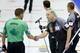 WINNIPEG, CANADA - DECEMBER 7: Skip John Morris (third rocks) and Skip Kevin Martin shake hands after Morris defeated Martin in the Men's Semifinal at the Roar of the Rings Canadian Olympic Curling Trials on December 7, 2013 at MTS Centre in Winnipeg, Manitoba, Canada. (Photo by Trevor Hagan/Getty Images)