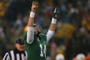 Hi-res-454199259-bryce-petty-of-the-baylor-bears-celebrates-a-touchdown_crop_north