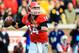 Nov 30, 2013; Atlanta, GA, USA; Georgia Bulldogs quarterback Hutson Mason (14) rolls out on a pass play in the first half against the Georgia Tech Yellow Jackets at Bobby Dodd Stadium. Mandatory Credit: Daniel Shirey-USA TODAY Sports