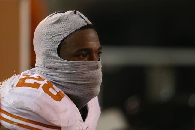 Hi-res-454237159-malcolm-brown-of-the-texas-longhorns-looks-on-during-a_crop_north