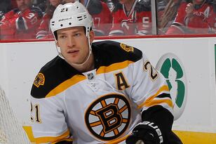 Hi-res-166413814-andrew-ference-of-the-boston-bruins-skates-against-the_crop_north