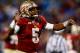CHARLOTTE, NC - DECEMBER 07: Quarterback Jameis Winston #5 of the Florida State Seminoles reacts against the Duke Blue Devils during the ACC Championship game at Bank of America Stadium on December 7, 2013 in Charlotte, North Carolina. (Photo by Streeter Lecka/Getty Images)