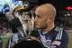 Dec 7, 2013; Kansas City, KS, USA; Sporting KC defender Aurelien Collin (78) kisses the championship trophy after the 2013 MLS Cup against the Real Salt Lake at Sporting Park. Sporting KC won in a shootout. Mandatory Credit: Peter G. Aiken-USA TODAY Sports