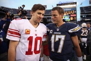 Hi-res-454342941-eli-manning-of-the-new-york-giants-and-philip-rivers-of_crop_north