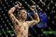 Apr 21, 2012; Atlanta, GA, USA; Michael McDonald celebrate winning a bantamweight bout against Miguel Angel Torres during UFC 145 at Philips Arena. McDonald won the bout by knockout in the first round. Mandatory Credit: Paul Abell-USA TODAY Sports