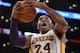 LOS ANGELES, CA - DECEMBER 08: Kobe Bryant #24 of the Los Angeles Lakers reacts as he grabs a rebound during the first half against the Toronto Raptors at Staples Center on December 8, 2013 in Los Angeles, California. NOTE TO USER: User expressly acknowledges and agrees that, by downloading and or using this Photograph, user is consenting to the terms and condition of the Getty Images License Agreement. (Photo by Harry How/Getty Images)