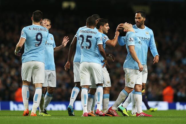 Hi-res-452768081-samir-nasri-of-manchester-city-celebrates-his-teams_crop_north