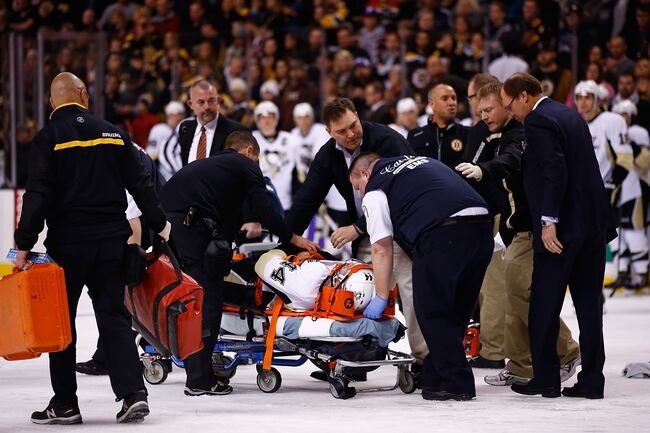 Hi-res-454208091-brooks-orpik-of-the-pittsburgh-penguins-is-carted-off_crop_north