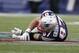 Dec 8, 2013; Foxborough, MA, USA; New England Patriots tight end Rob Gronkowski (87) lies on he ground after getting injured by a Cleveland Browns player during the third quarter at Gillette Stadium. Mandatory Credit: Stew Milne-USA TODAY Sports