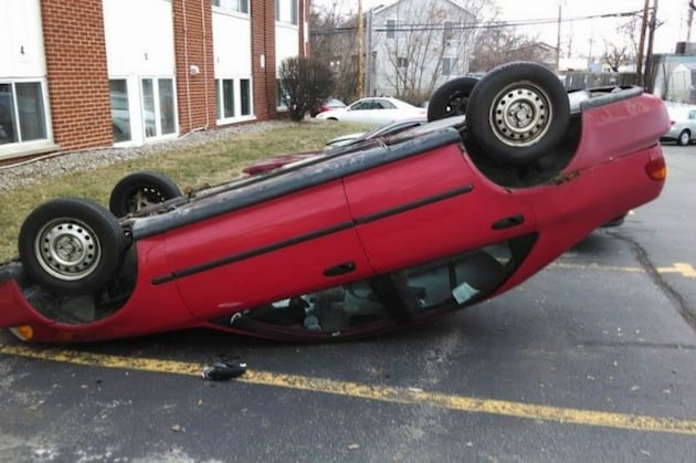 Michigan State Football: Students Fund Flipped-over Car