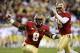 Dec 1, 2012; Charlotte, NC, USA; Florida State Seminoles defensive tackle Timmy Jernigan (8) celebrates with defensive end Bjoern Werner (95) after sacking Georgia Tech Yellow Jackets quarterback Vad Lee (2) (not pictured) in the first quarter in the ACC Championship at Bank of America Stadium. Mandatory Credit: Bob Donnan-USA TODAY Sports