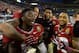 Dec 7, 2013; Charlotte, NC, USA; Florida State Seminoles wide receivers Kenny Shaw (81) and Kelvin Benjamin (1) and quarterback Jameis Winston (5) and wide receiver Rashad Greene (80) react at the end of the game. The Seminoles defeated the Blue Devils 45-7 at Bank of America Stadium. Mandatory Credit: Bob Donnan-USA TODAY Sports