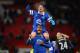 MANCHESTER, ENGLAND - DECEMBER 04: Bryan Oviedo of Everton (top) celebrates with team-mate Sylvain Distin at the end of the Barclays Premier League match between Manchester United and Everton at Old Trafford on December 4, 2013 in Manchester, England. (Photo by Michael Regan/Getty Images)
