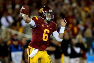 Hi-res-452666685-quarterback-cody-kessler-of-the-usc-trojans-throws-a_crop_north