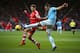 SOUTHAMPTON, ENGLAND - DECEMBER 07: Adam Lallana of Southampton and Martin Demichelis of Manchester City in action during the Barclays Premier League match between Southampton and Manchester City at St Mary's Stadium on December 7, 2013 in Southampton, England. (Photo by Bryn Lennon/Getty Images)