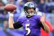 BALTIMORE, MD - NOVEMBER 24: Quarterback Joe Flacco #5 of the Baltimore Ravens throws a first half pass against the New York Jets at M&T Bank Stadium on November 24, 2013 in Baltimore, Maryland. (Photo by Rob Carr/Getty Images)