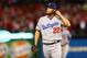 ST LOUIS, MO - OCTOBER 18: Pitcher Clayton Kershaw #22 of the Los Angeles Dodgers reacts while on the mound in the third inning against the St. Louis Cardinals in Game Six of the National League Championship Series at Busch Stadium on October 18, 2013 in St Louis, Missouri. (Photo by Elsa/Getty Images)