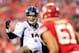 KANSAS CITY, MO - DECEMBER 01: Quarterback Peyton Manning #18 of the Denver Broncos prepares to snap the ball during the game against the Kansas City Chiefs at Arrowhead Stadium on December 1, 2013 in Kansas City, Missouri. (Photo by Jamie Squire/Getty Images)
