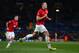 MANCHESTER, ENGLAND - DECEMBER 10: Phil Jones of Manchester United celebrates scoring the opening goal during the UEFA Champions League Group A match between Manchester United and Shakhtar Donetsk at Old Trafford on December 10, 2013 in Manchester, England. (Photo by Michael Steele/Getty Images)