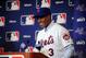 Dec 10, 2013; Orlando, FL, USA; Curtis Granderson smiles as he is introduced by the New York Mets during the MLB Winter Meetings at the Walt Disney World Swan and Dolphin Resort. Mandatory Credit: David Manning-USA TODAY Sports