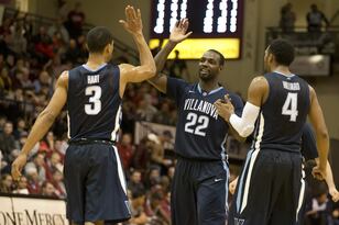Hi-res-454218839-forward-jayvaughn-pinkston-reacts-after-making-a-basket_crop_north